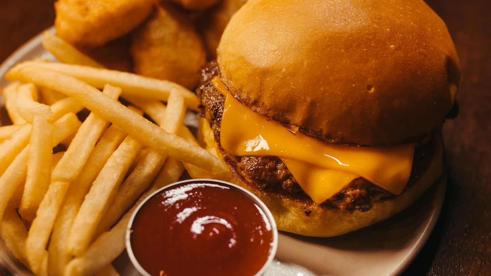 Cheeseburger and fries with ketchup